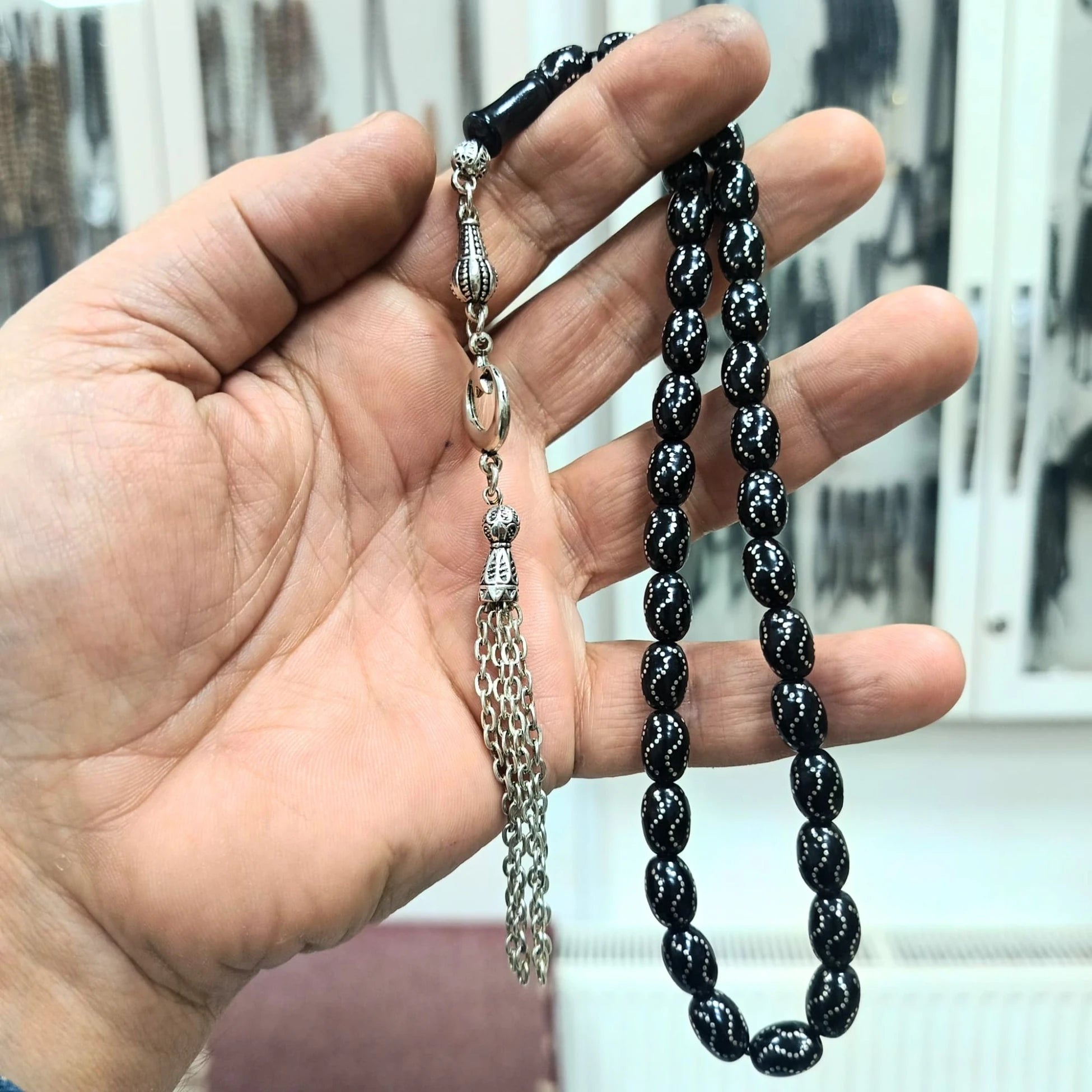 Oval-Cut Press Oltu Stone Tasbih with Silver-Plated Tassel, 8x10mm