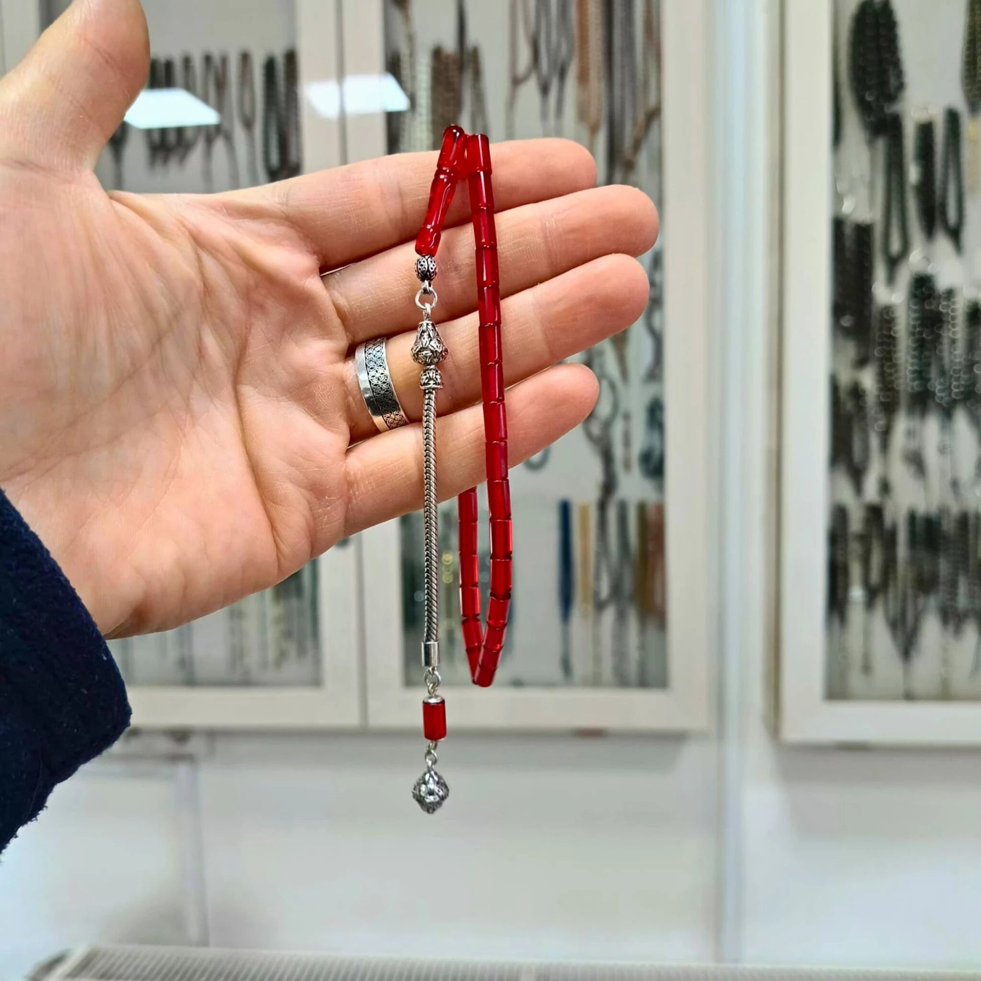 Faceted-Cut Pressed Amber Tasbih with Silver Tassel, 5x8mm