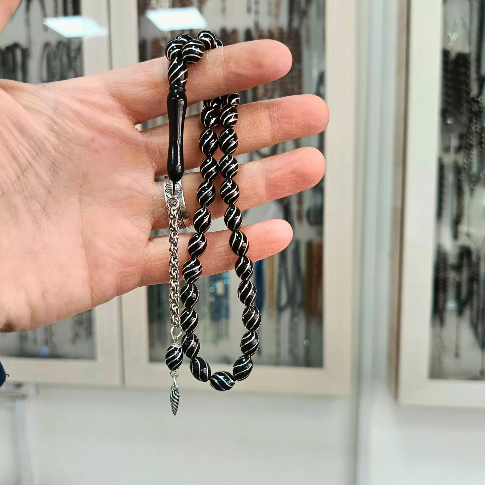 Oval-Cut Collector's Erzurum Oltu Stone Tasbih with Silver Cesmi Bulbul Inlay, 7x9.5mm