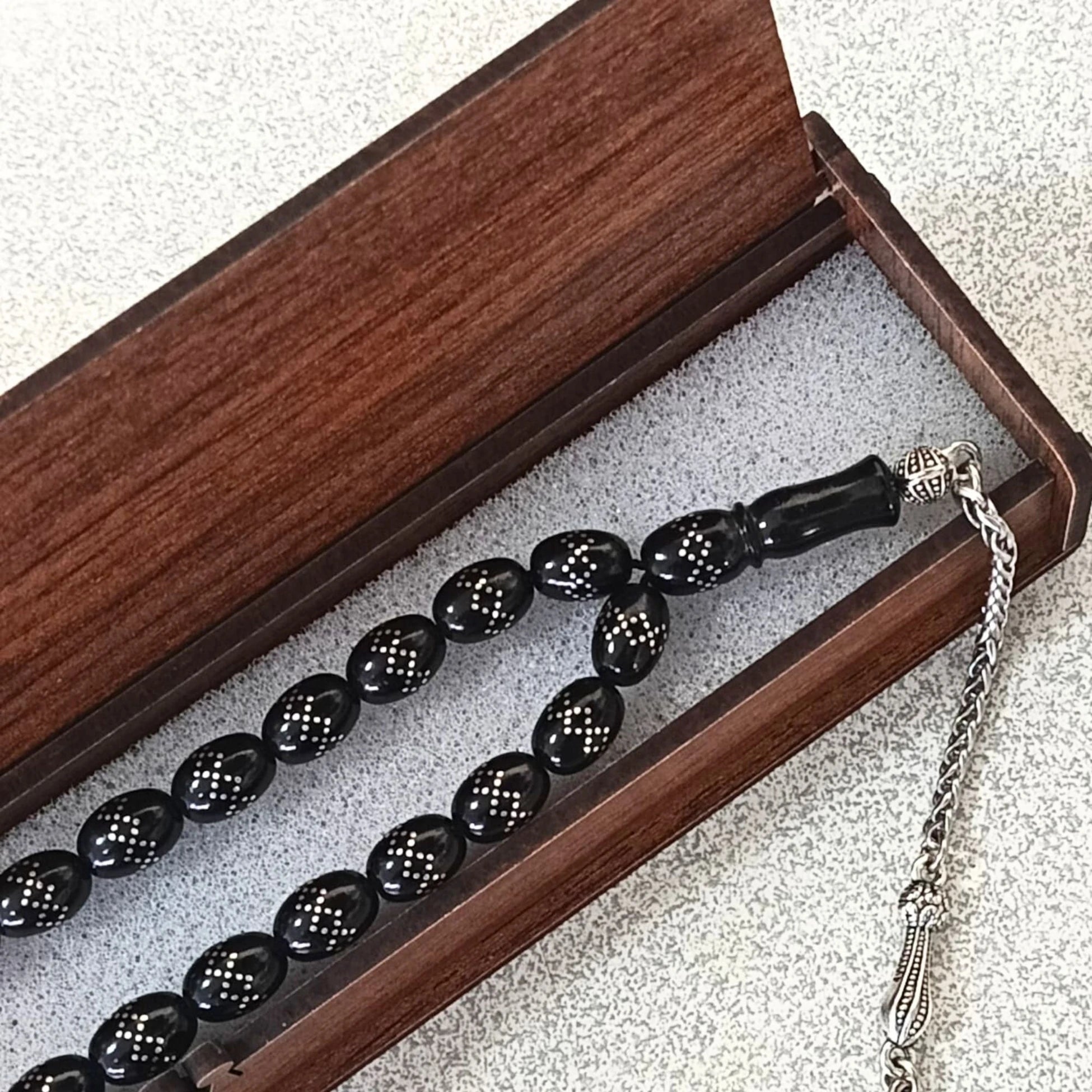 Oval-Cut Press Oltu Stone Tasbih with Silver Inlay, 8x10mm